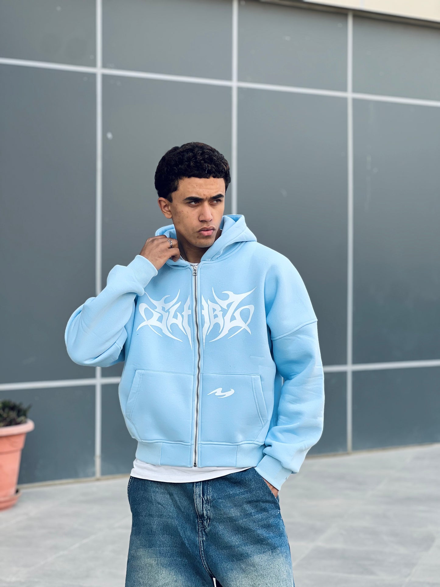 Boxy baby blue zipper