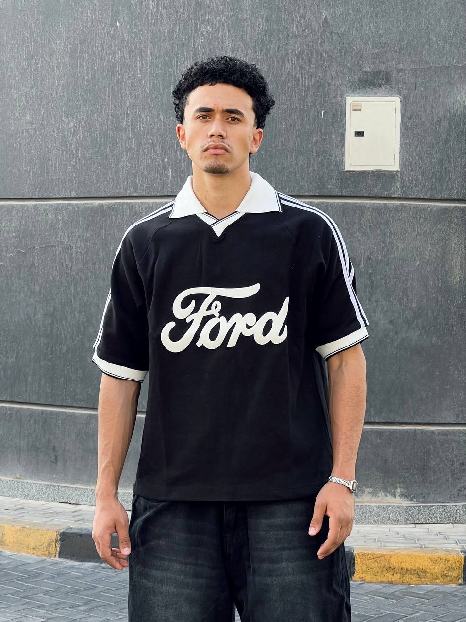 Striped black polo