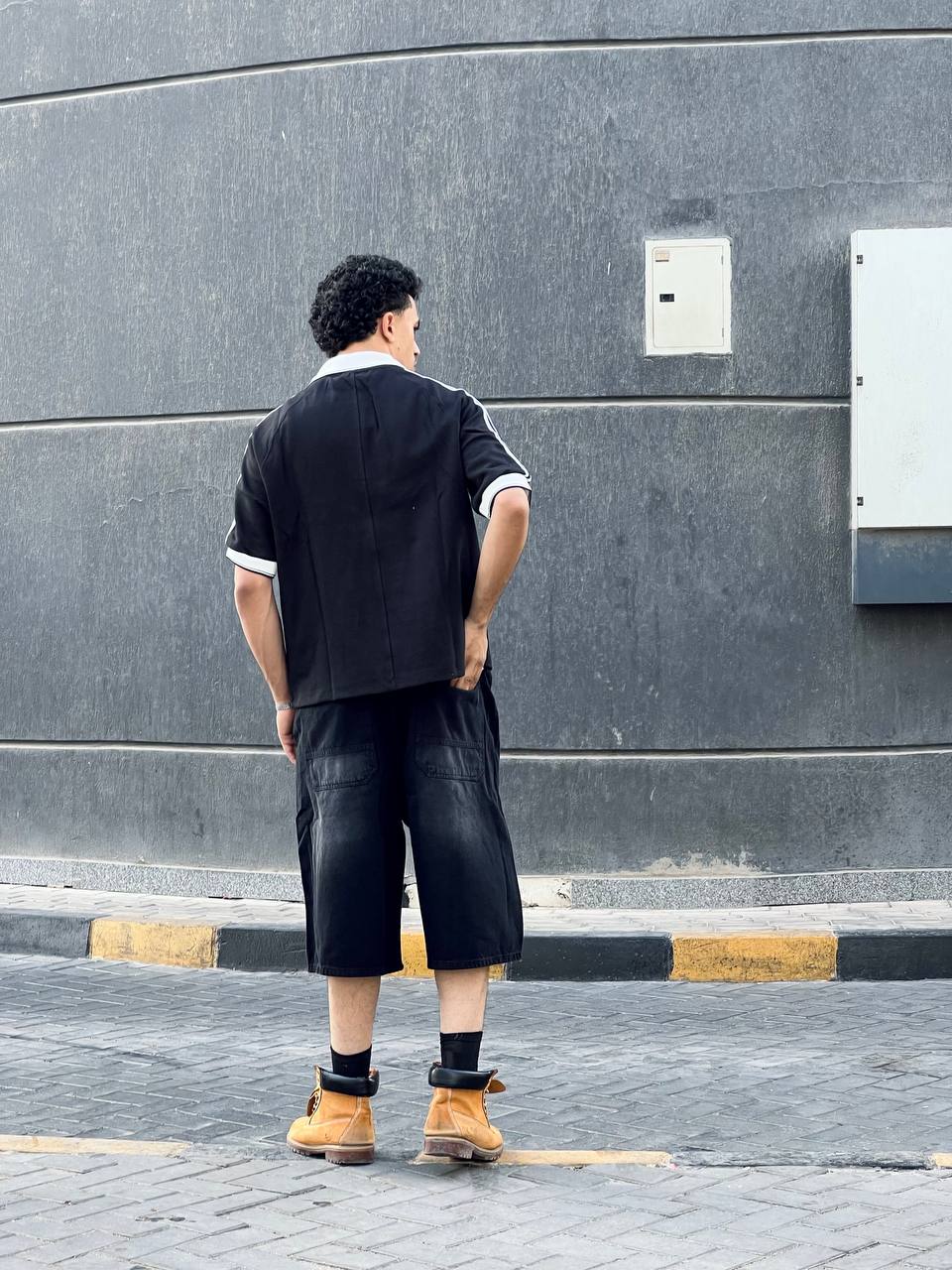 Striped black polo